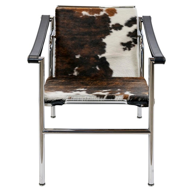 Vintage LC1 chair designed by Le Corbusier, Pierre Jeanneret, Charlotte Perriand, circa 1928. Base in chromed tubular...
