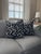 Bring a bold, modern touch to your space with this custom-made pair of 22” pillow covers, featuring a striking black and...