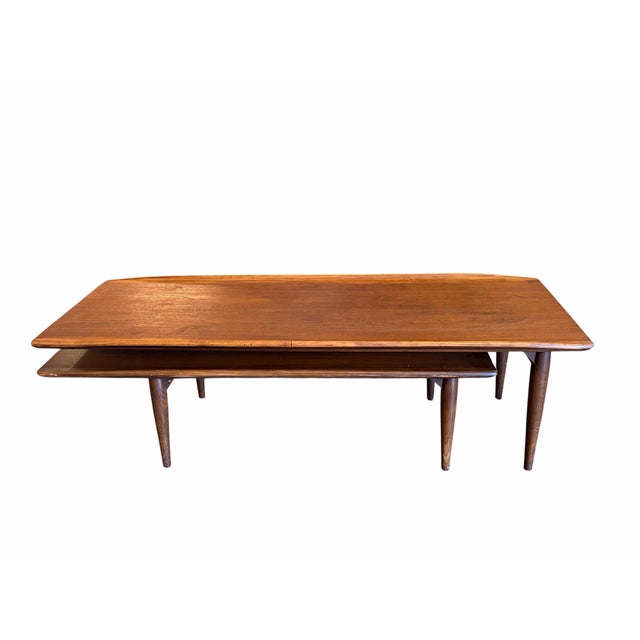 Make a striking mid-century statement with this rare "Switchblade" Swivel Coffee Table. Combining iconic 1960s Danish...