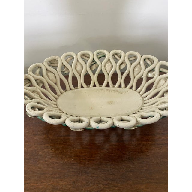 Charming hand formed and painted green and white majolica bowl. This piece has too much character for words but can’t you...