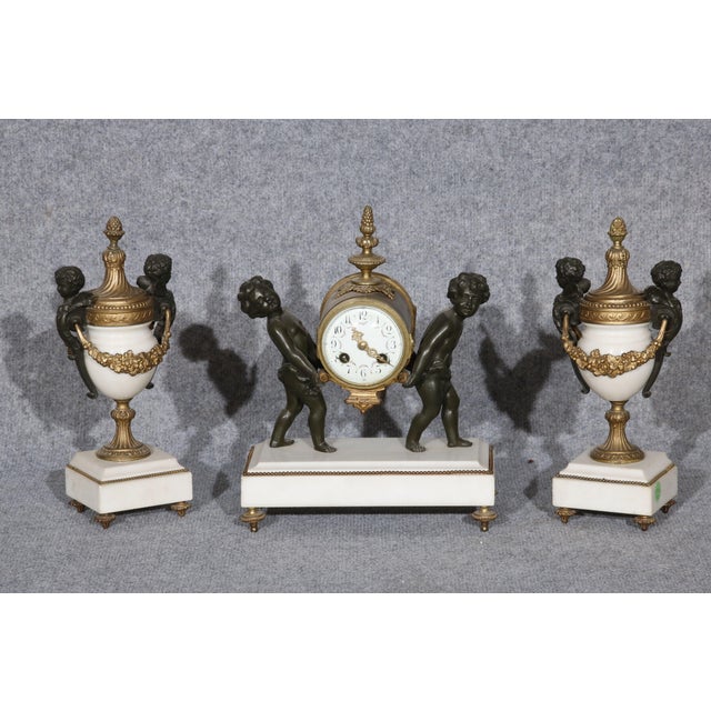 Napoleon II Louis XVI Style Fireplace Clock with Putti Carrying a Dial, 1860s, Set of 3 For Sale - Image 6 of 18