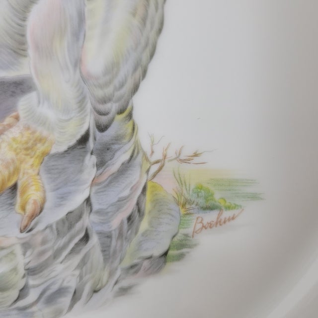 This decorative charger plate was produced by Edward Marshall Boehm as part of the Young America 1776 series, adapted from...