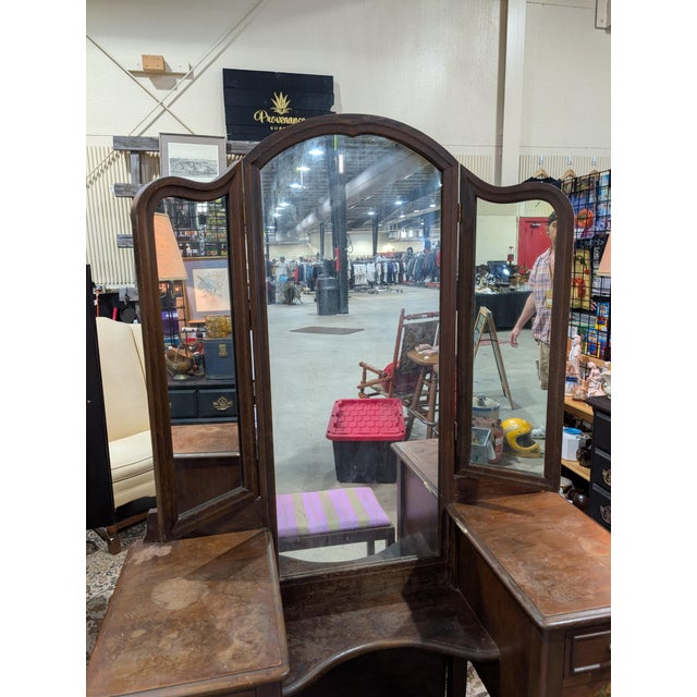 A charming twin-pedestal American Colonial Revival vanity set from the 1920s, manufactured by National Furniture Company...