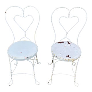 A Pair of Vintage Twisted Iron Heart Back Ice Cream Chairs For Sale