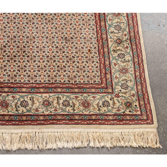 Perisan Herati Wool Rug, with repeating central floral design surrounded by floral border on beige ground. 9' 5" L x 8'...