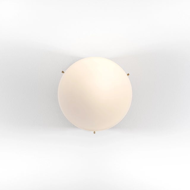 The Solare Virgin Wall / Ceiling Light brings elegance to midcentury design through the inspiration of Italian design -...
