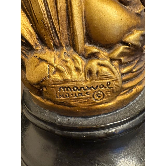 In the 1950’s through the 1969’s figural sculptures were fashionable. This pair of Grecian figurines are made from...