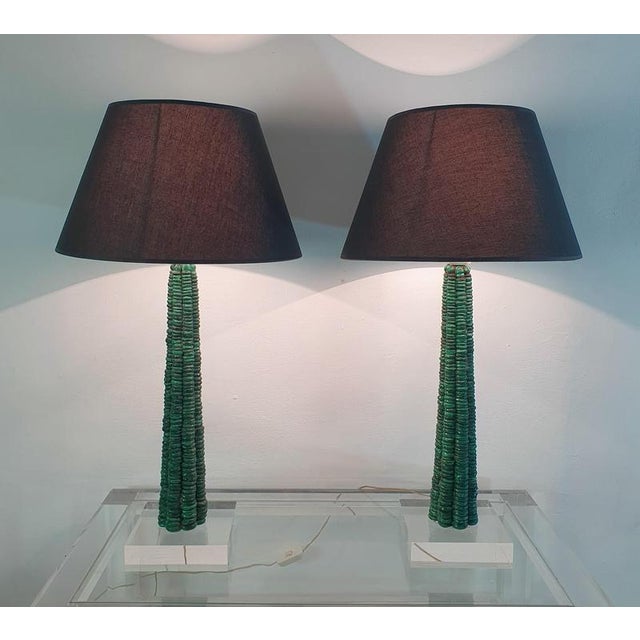 A large pair of elegant table lamps with a clean and modern design. Hand made from malachite stone column which is...