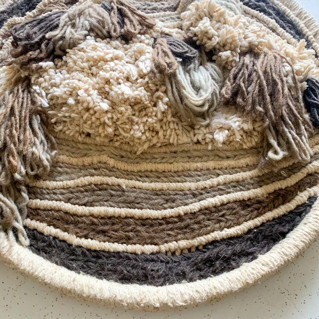 Incredible 70s mid century modern, handmade woven wall hanging. Great earthy tones of brown and off white. Woven on a bike...