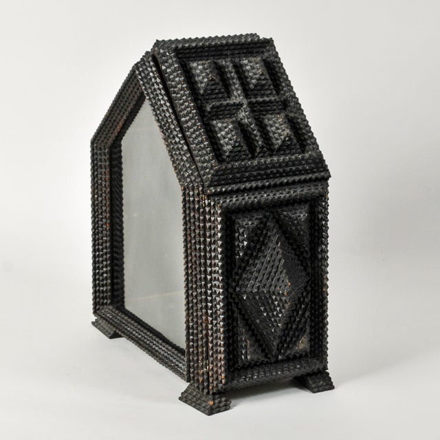 This exceptional offering is a genuine piece of 19th-century history: a Tramp Art Nicho Box of German origin. We are...