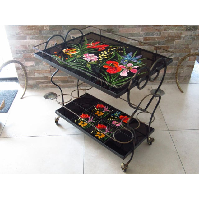 - Mid-century bar cart, 1950s - Wrought iron frame with handpainted Vallauris tiles - Signed: Vallauris