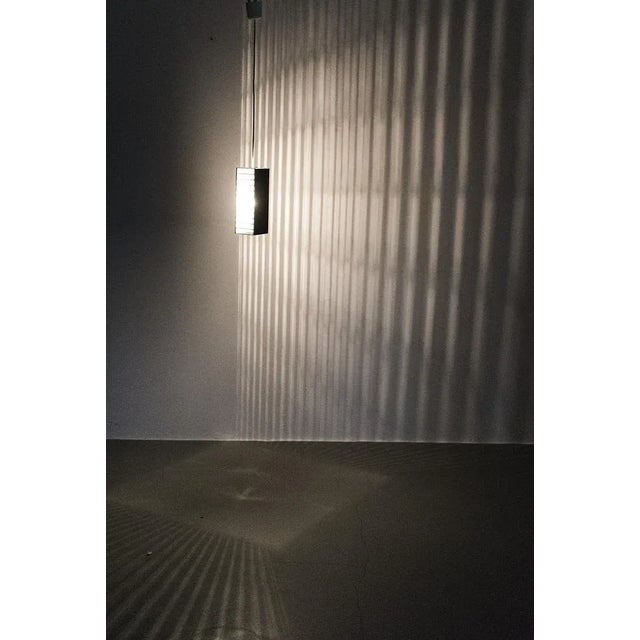 Nice hanging lamps made of perforated metal. When you turn on the lamp you see a beautiful pattern of light on the wall....