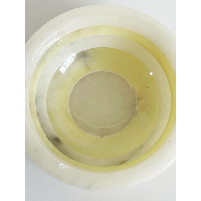 Gorgeous italian alabaster bullseye striped ashtray measuring 6" in diameter.