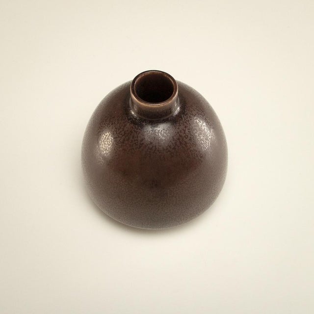 Model 39 vase in brown hare’s fur glaze. Designed by Eva Stæhr-Nielsen. Thrown by Oskar Olsen. Saxbo, Denmark 1950s. This...