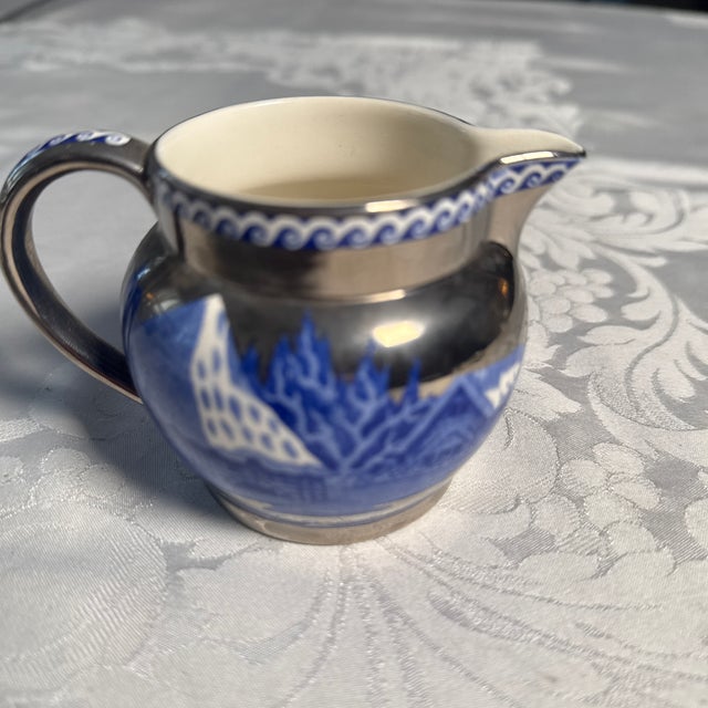 Wedgwood “Fallow Deer” Blue/Platinum Creamer. 3” high x 2.25” wide at rim (not spout). Excellent estate condition.