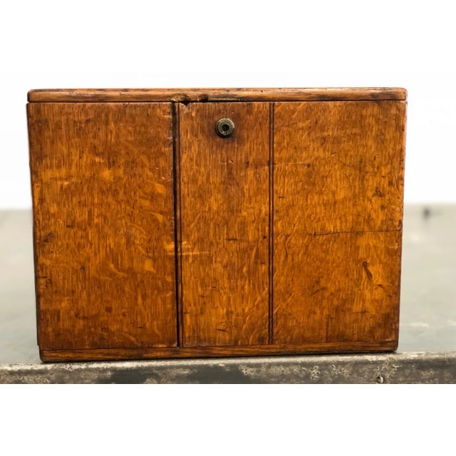 Fabulous old oak letter box. Inset brass campaign handles on either end. Inset brass pulls on interior drawers. Brass name...