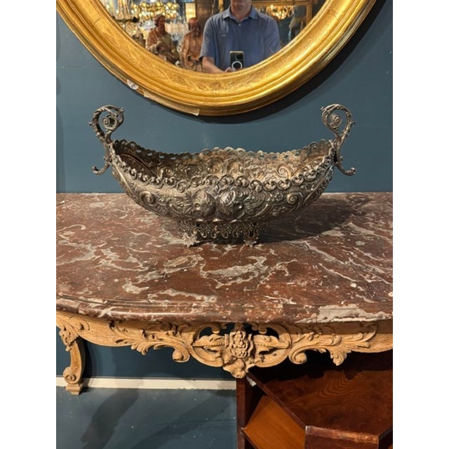 This 19th century Austrian silver plate jardiniere is a rare and exquisite decorative collectible piece. The intricate...