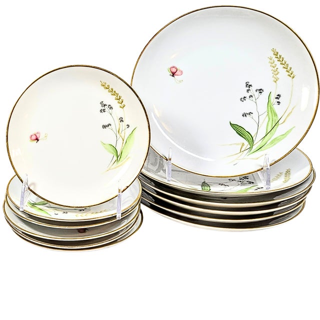 These gorgeous gold rimmed plates are a thing of natural beauty- simple wildflowers and grasses offset by a single, simple...