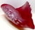 A wave of festive, art-glass-cased vintage conch-shell and centerpiece, Polish-styled Glass Art, characterized by a...