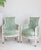 Elevate your space with the Remy Green Cheetah Chair, featuring an antique white painted frame, antique brass casters,...