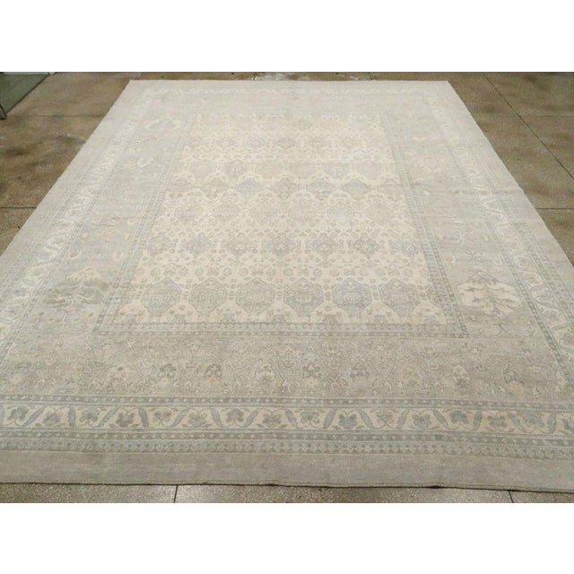 A vintage Turkish Anatolian oversize carpet handmade during the Mid-20th century. Measures: 12' 10" x 16' 0"