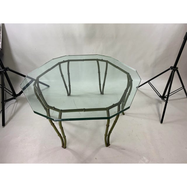 Mid-Century Modern Faux Bamboo CastIron Glass Top Coffee Table. Coffee table is made out of CastIron and has a great...