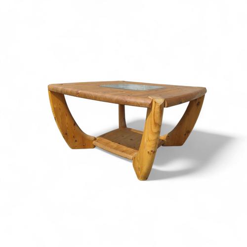 Specifications The brand Step back into the 1970s with this exquisite pine coffee table attributed to the renowned...