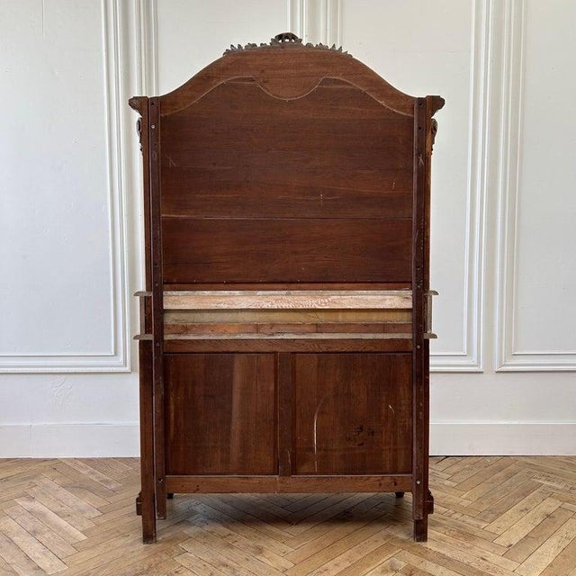 Walnut buffet w/mirror and marble top. Double drawers and doors. Size: 47”w x 20”d x 80”h Countertop height: 33”h.