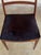 A refined and sculptural set of six Danish Modern dining chairs attributed to celebrated Danish designer Arne Vodder....