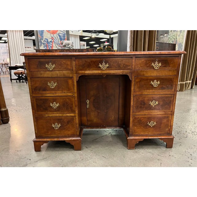 19th-Century Georgian crossbanded walnut kneehole console. Rich color burl top with herringbone inlay and crossbanding...
