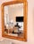 Large French giltwood Louis Philippe mirror featuring a classic rectangular form with softly rounded upper corners,...