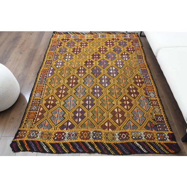 Vintage Turkish Hand-Knotted vintage rug is a semi-antique vintage area rug.'70s Eastern region of Turkey's unique rug is...