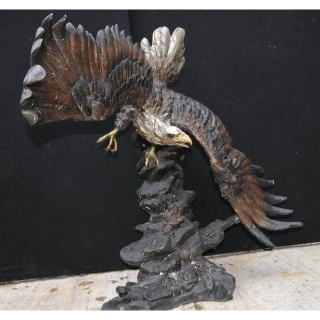 Impressive large 20th century bronze sculpture of an american bald eagle in flight. As you can see the full wing span is...