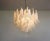 Murano Italian glass chandelier. Fantastic chandelier with trasparent and white “lattimo” glasses, nickel-plated metal...