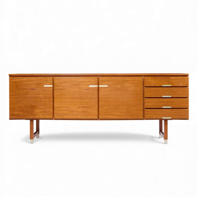 Kai Kristiansen for Feldballes Møbelfabrik Mid Century Danish Teak and Brass Credenza This credenza measures: 82.75 wide x...