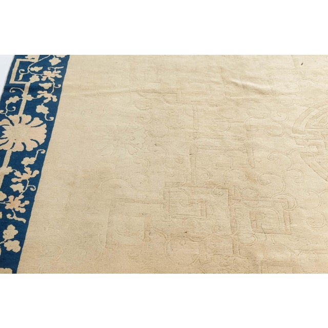 Vintage Chinese Rug Size: 8'4" × 10'10" (254 × 330 cm) This sophisticated 1920s Chinese rug is a compelling representation...