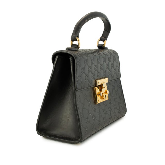 Brand: Gucci Gender: Ladies Measurements: (W x H x D): 10.75" x 7.75" x 4.25" Weight: 1,010.00 grams Gucci Gg Signature...