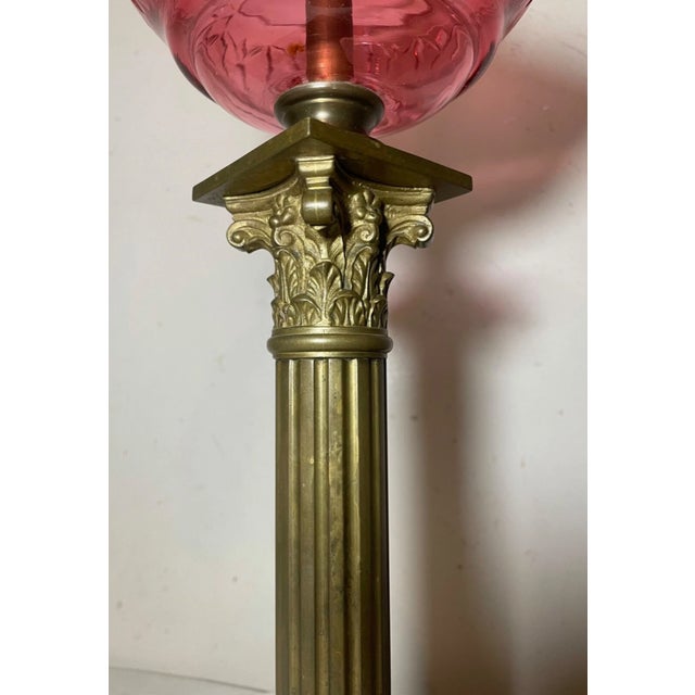French Antique Ornate Gilt Bronze Cranberry Cut Glass Electrified Oil Pillar Table Lamp For Sale - Image 3 of 12