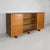 Italian mid-century modern sideboard in wood, glass and burgundy leather, 1960s Sideboard or display with a contoured top...
