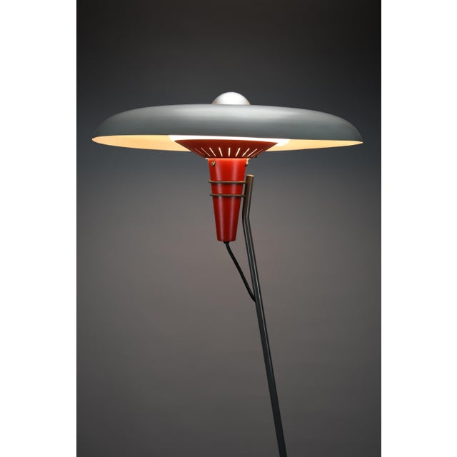 Mid century tripod floor lamp nx 38 by louis kalff for philips with red cone and grey saucer shade, netherlands, 1950s...