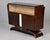 Found in France, this medium-sized French Art Deco buffet dates from the late 1930s / early 1940s. Curved pedestal base...