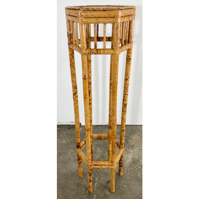 Vintage bamboo plant stand extraordinarily tall at a spectacular 48.5"H. Features hex shaped top with split reed framing...