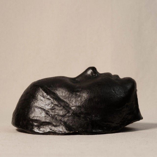 Studio Pottery Black Ceramic Detailed Face Sculpture This face sculpture depicts a full facial cast with closed eyes, a...
