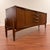 Striking vintage mid-century sideboard made in the U.K. by Elliott's of Newbury circa 1960's. Design cues include rocket-...