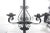 Pair of large black wrought iron three arm candle sconces made in Spain.these have beautiful hammered detail on the metal...