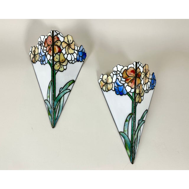 Illuminate your home with the enchanting glow of this exquisite pair of vintage sconces, originating from France and...
