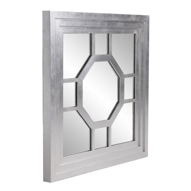 Our Palmer Mirror is a play on geometric shapes. A square wood frame encompasses an octagonal windowpane design. The piece...