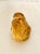 Small Buddha figure made of amber colored crystal. Very similar to Baccarat or Lalique figures, but unsigned, so maker is...