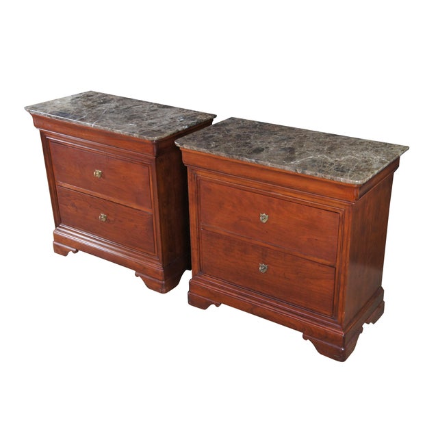 Pair of Stickley French Louis Philippe Style Chests or Nightstands, circa 2005. Made from solid cherry with a marble top...