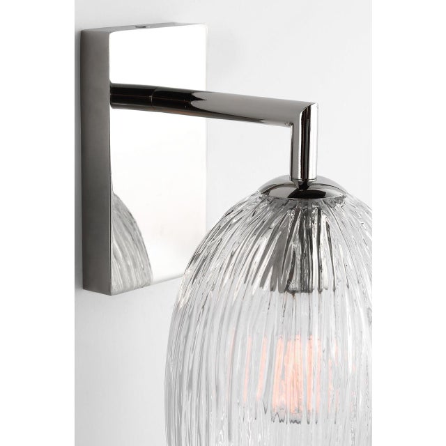 Serafina 10-inch Sconce by Hable brings sculptural elegance to the wall with a soft, organic silhouette inspired by the...